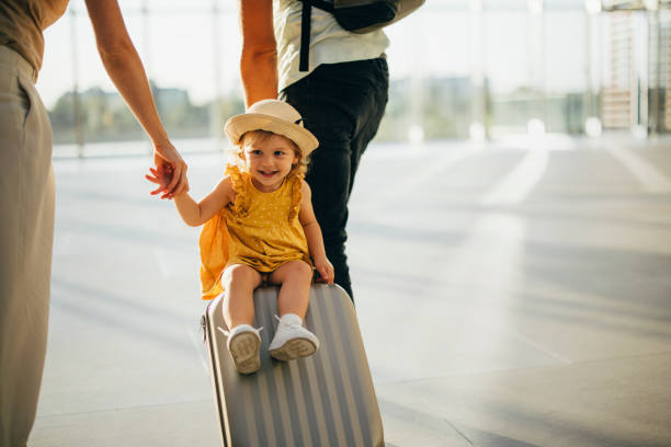 istock Young Family Having Fun Traveling Together 1352753083