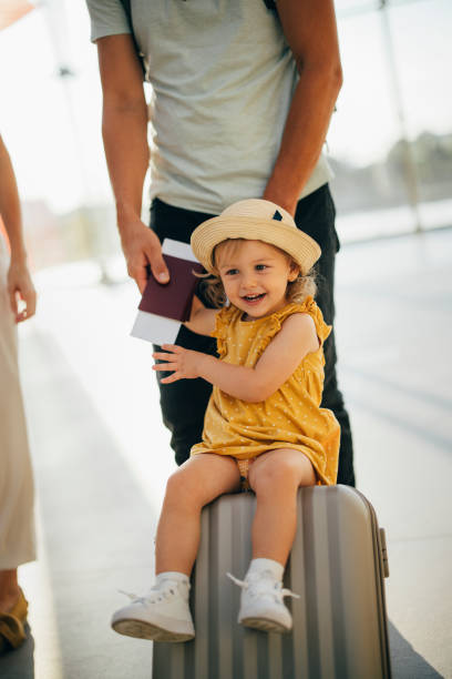 istock Young Family Having Fun Traveling Together 1352753087