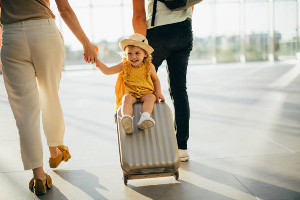 istock Young Family Having Fun Traveling Together 1352753088