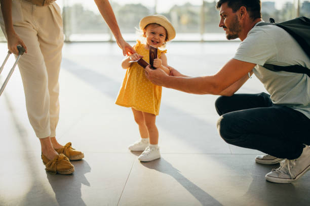 istock Young Family Having Fun Traveling Together 1352753089