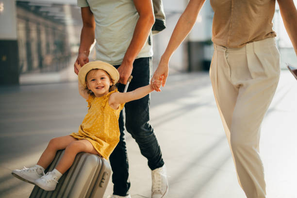 istock Young Family Having Fun Traveling Together 1352753090