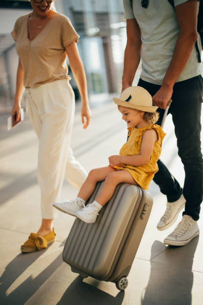 istock Young Family Having Fun Traveling Together 1352753092