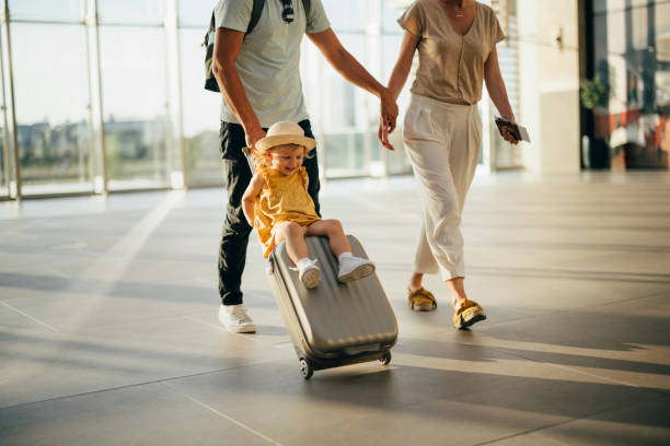 istock Young Family Having Fun Traveling Together 1352753098