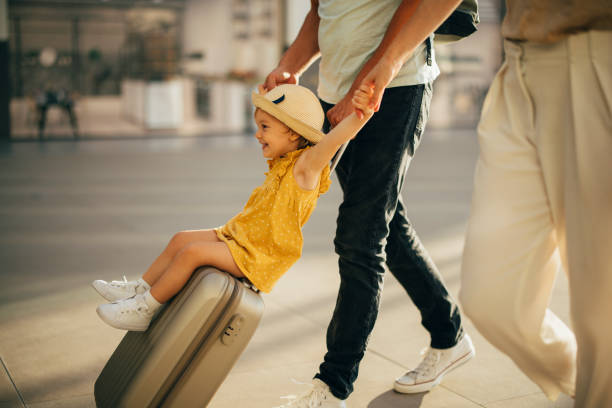 istock Young Family Having Fun Traveling Together 1352753100
