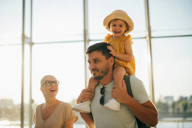 istock Young Family Having Fun Traveling Together 1352753123