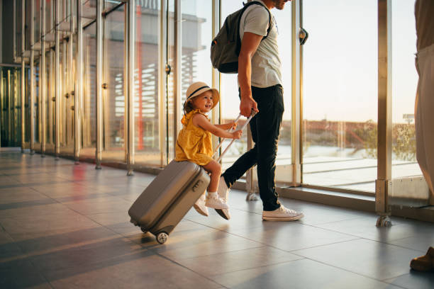 istock Young Family Having Fun Traveling Together 1352753159