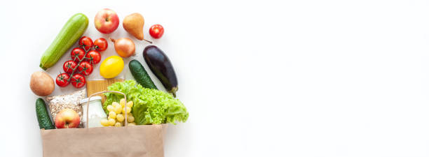 istock Food bag with grocery on white banner 1352758424