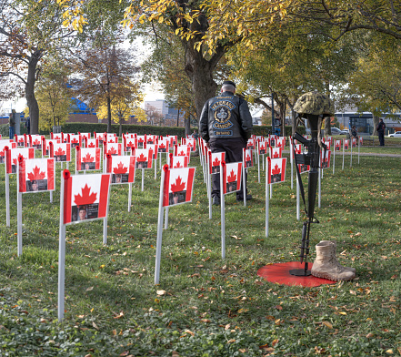 Windsor, Ontario, Canada - November 11, 2021:  Remembrance Day in Windsor, Ontario, on the grounds of Windsor City Hall.  The day honours fallen Canadian Soldiers and all who gave services in the Armed Forces through various wars, conflicts and miscellaneous missions.