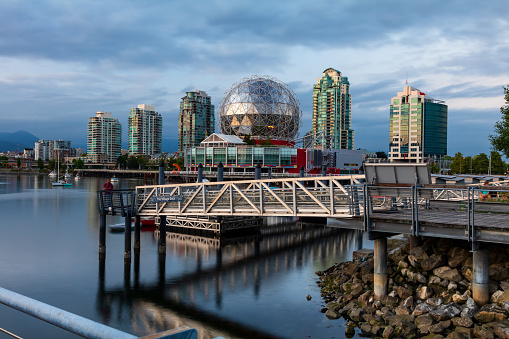 Vancouver, British Columbia, Canada - July 1, 2021: Science World, located along the shores of False Creek under moody skies.