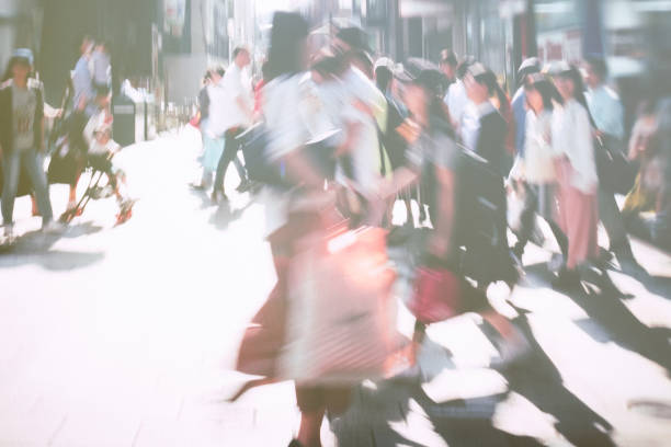 istock Image of a person walking fast 1352771817