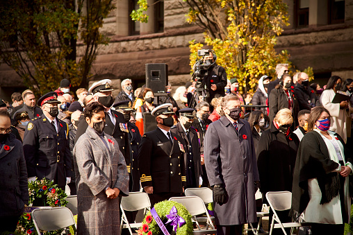 Toronto, Ontario, Canada- November, 11 2021; A group of important people to celebrate remembrance day at Toronto old city hall that include MP Marci Ien, mayor John Tory and MPP Suze Morrison plus other military members.