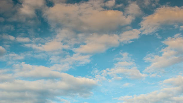 istock Sky, filled with fluffy natural clouds. Beautiful abstract background. The atmosphere in summer 1352774082