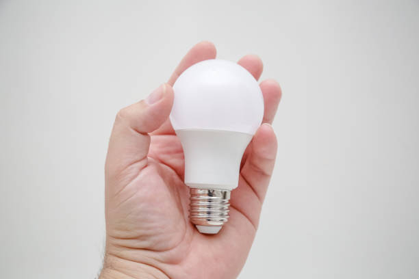 istock Energy lamp in a person's hand. 1352781937