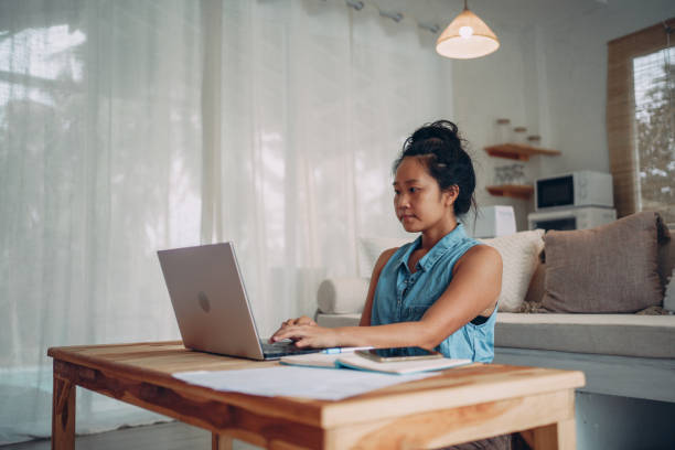 istock Woman working remotely from home 1352785049