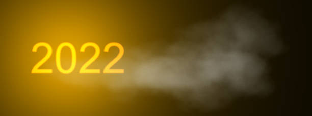 istock 2022 Golden and black glow new year background include light dark cloud smoke steamer and glitter 1352787302