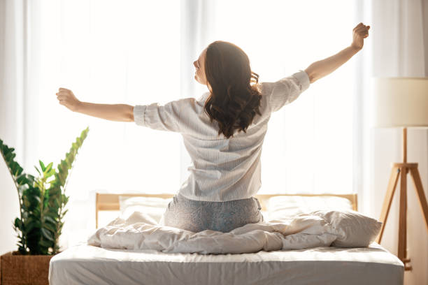 istock woman enjoying sunny morning 1352791682