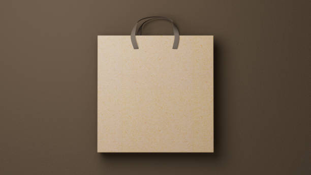 Cardboard shopping bag on brown background.