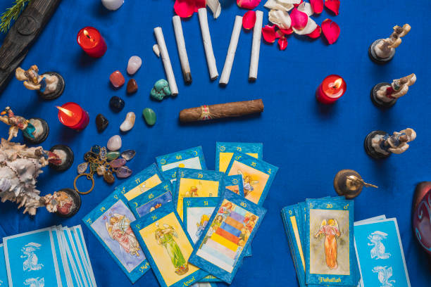 istock top view of tarot cards, statuettes and miscellaneous objects 1352797686