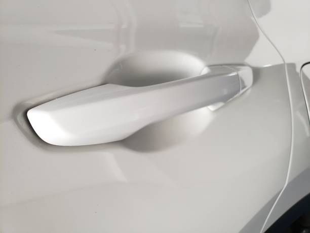 istock close up glossy white minibus car door handle 1352801589