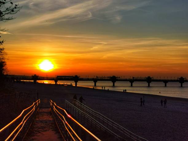 istock Sunset on the Baltic Sea at a pier 1352803589