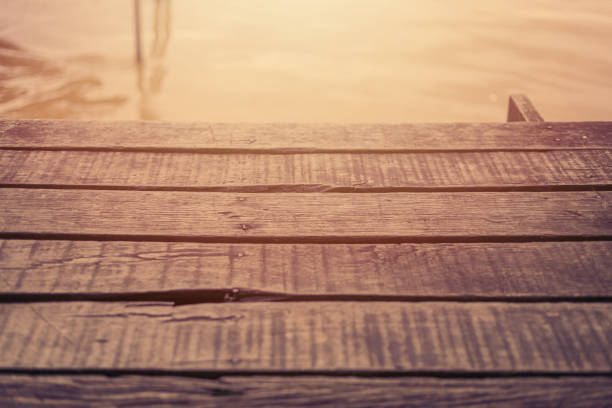 wooden waterfront old wood planks pier at river background blank space