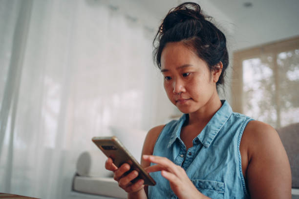istock Woman scrolling through social media 1352812679