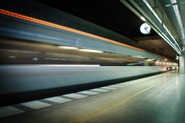 istock Train in fast movement at Centralen in Malmo Sweden 1352815112