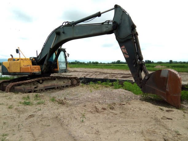 istock big excavator next to a gravel pit 1352815696