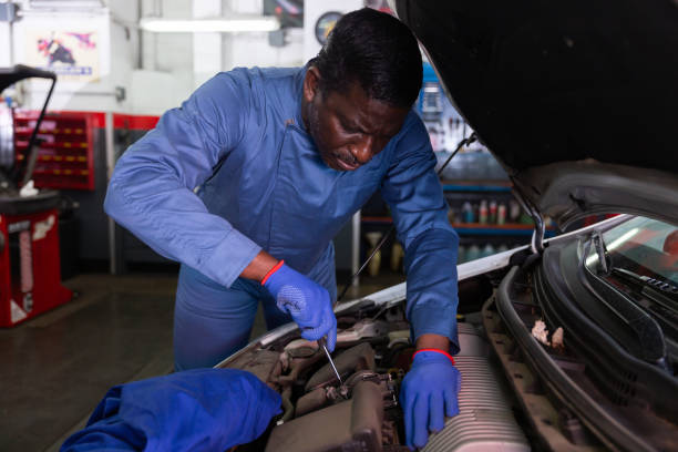 istock Skilled mechanic technician working at service station 1352816727