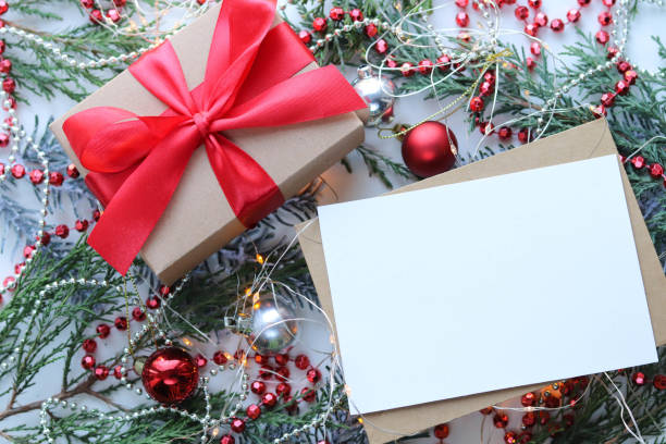 istock gift box with bow and fir branches with Christmas decorations 1352818062