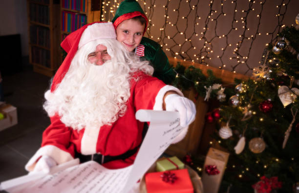 istock Santa, Elf and Wish List 1352818156