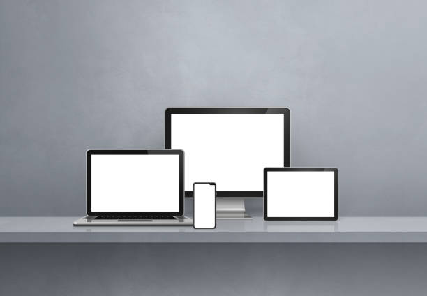 istock Computer, laptop, mobile phone and digital tablet pc. Grey shelf banner 1352820701