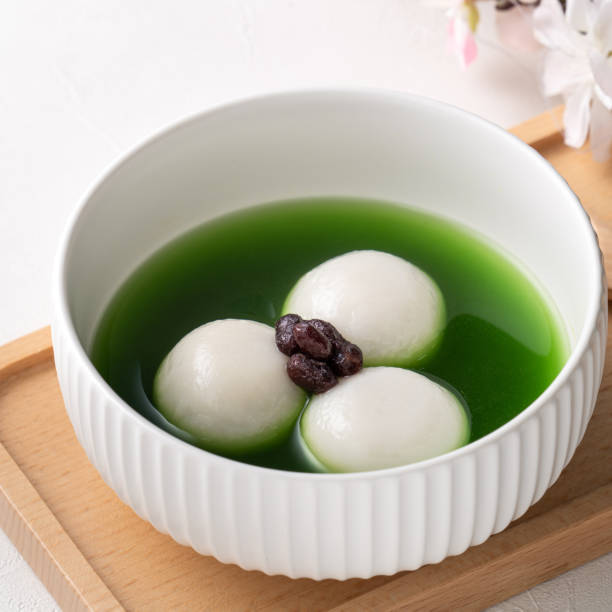 istock Matcha big tangyuan with red bean paste and matcha soup. 1352823428