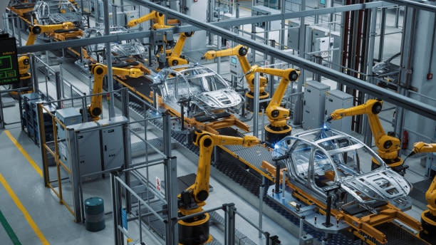 Car Factory 3D Concept: Automated Robot Arm Assembly Line Manufacturing High-Tech Green Energy Electric Vehicles. Construction, Building, Welding Industrial Production Conveyor. Elevated Wide Shot concepto 3d de fábrica de automóviles: línea de ensamblaje de brazo robótico automatizado fabricación de vehículos eléctricos de energía verde de alta tecnología. construcción, edificación, soldadura transportador de producción industrial. disp