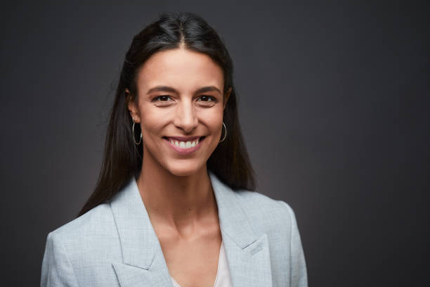 istock A young businesswoman smiling at the camera. 1352825751