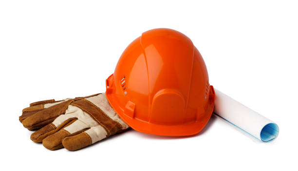 istock Safety hardhat and work gloves isolated on white background 1352825908