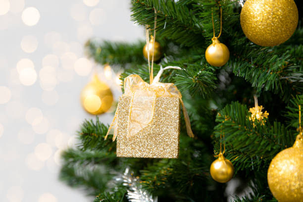 istock Christmas Tree with golden gift box and ornament, Holidays Concepts 1352833495