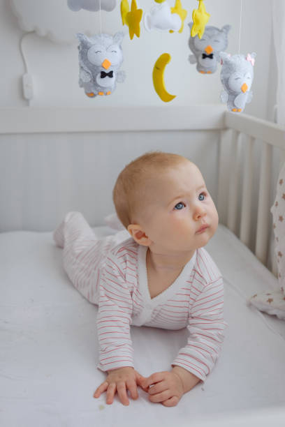 istock A baby laying on stomach learning to hold head up 1352833821