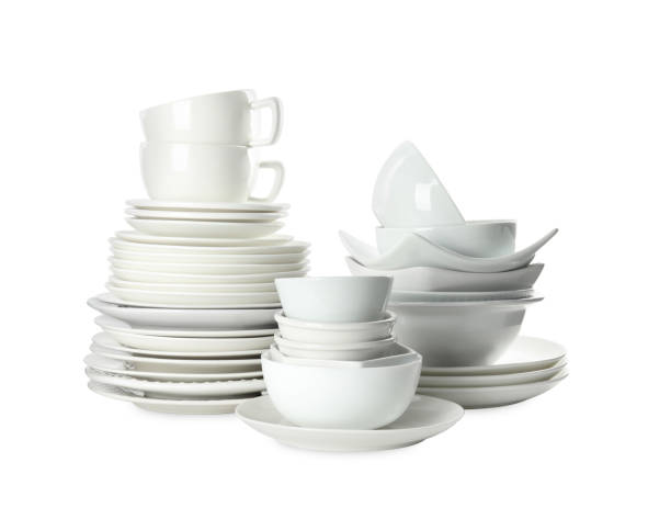 istock Set of clean dishware isolated on white 1352841420