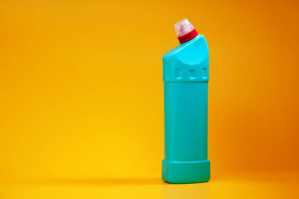 istock House cleaning detergent bottles on a yellow background 1352843454