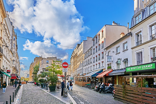 Paris, France - September 29, 2021: Pedestrians in the streets of Montmartre a district of Paris.