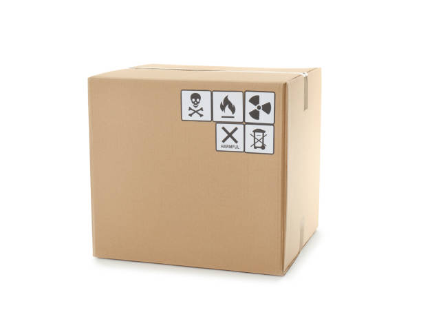 istock Cardboard box with shipping label isolated on white 1352848754