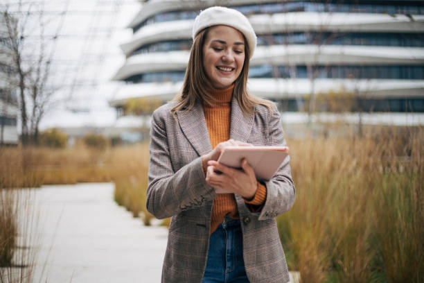 istock Businesswoman with digital tablet 1352850750