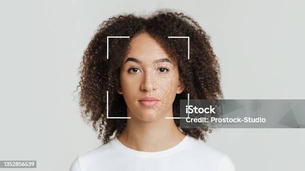 Biometric Facial Recognition Of Calm Young African American Female Isolate On Gray Background Stock Photo - Download Image Now
