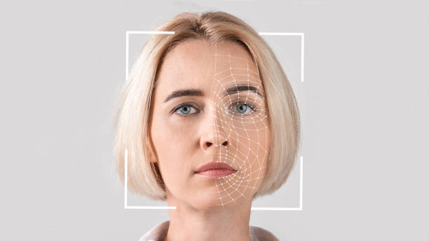 istock Interface, software for face recognition of young serious blonde lady 1352856591