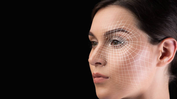 istock Face recognition of serious millennial caucasian lady with biometric smart identification, isolated on black background 1352856597