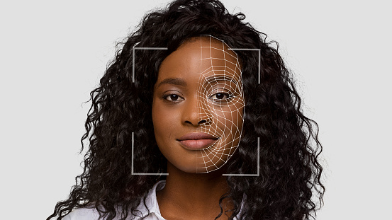 Cheerful cute black lady make identity authentication for personal data protection, double exposure and digital hologram. Facial scanning and recognition, innovations of future and biometric, collage