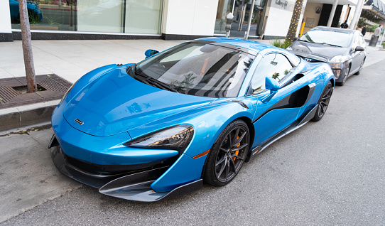 Los Angeles, California USA - April 14, 2021: blue McLaren Automotive Limited 720S luxury supercar parked in LA the U.S. state of California. corner view.