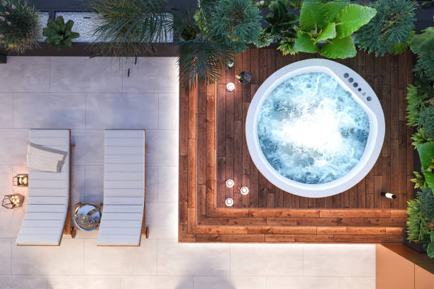 Luxury apartment terrace with hot tub hot tub Luxury apartment terrace with hot tub hot tub. Wooden platform, plants, candles and LED light. Template for copy space. Render. hot tub stock pictures, royalty-free photos & images