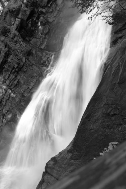 istock Waterfall in the Mountains b/w 1352862050